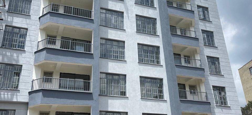 Modern high-rise residential building in Spring Den, equipped with premium lifts for smooth and efficient vertical transportation.