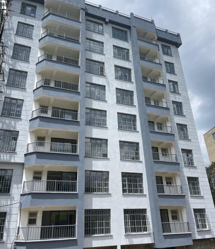 Modern high-rise residential building in Spring Den, equipped with premium lifts for smooth and efficient vertical transportation.